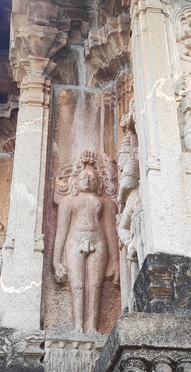 Buddha appears to be the natural successor in the sequence but here, the sculptor prefers to portray a Jain Tirthankara as an Avatar of Vishnu. Notice the smaller Tirthankaras at the base panel