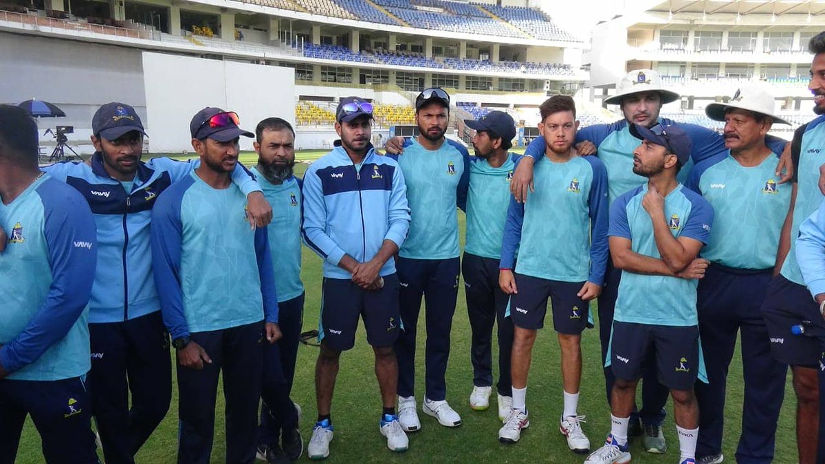 CabCricket's tweet photo. Bengal coach #ArunLal handed over the debut cap to #SudipKumarGharami today before the start of #RanjiTrophy final against #Saurashtra today at Saurashtra Cricket Association Stadium.
#CAB
#SAUvBEN
#SupportTeamBengal https://t.co/tkdpCpspnj