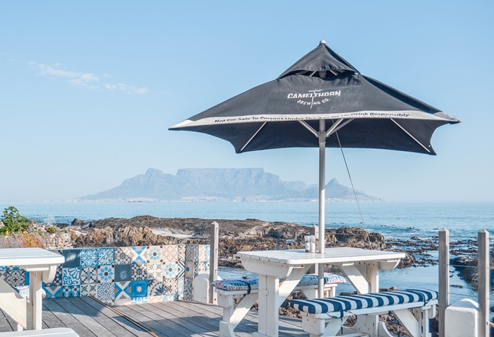 On_The_RocksZA's tweet photo. Enjoy the waves crashing over the rocks this Monday morning. Can you think of a better way to kick start your new week?
#newweek #wavessplashing #tablemountainbackdrop #diningwithaview #bloubergstrand #westcoast https://t.co/kmZo6zszVc