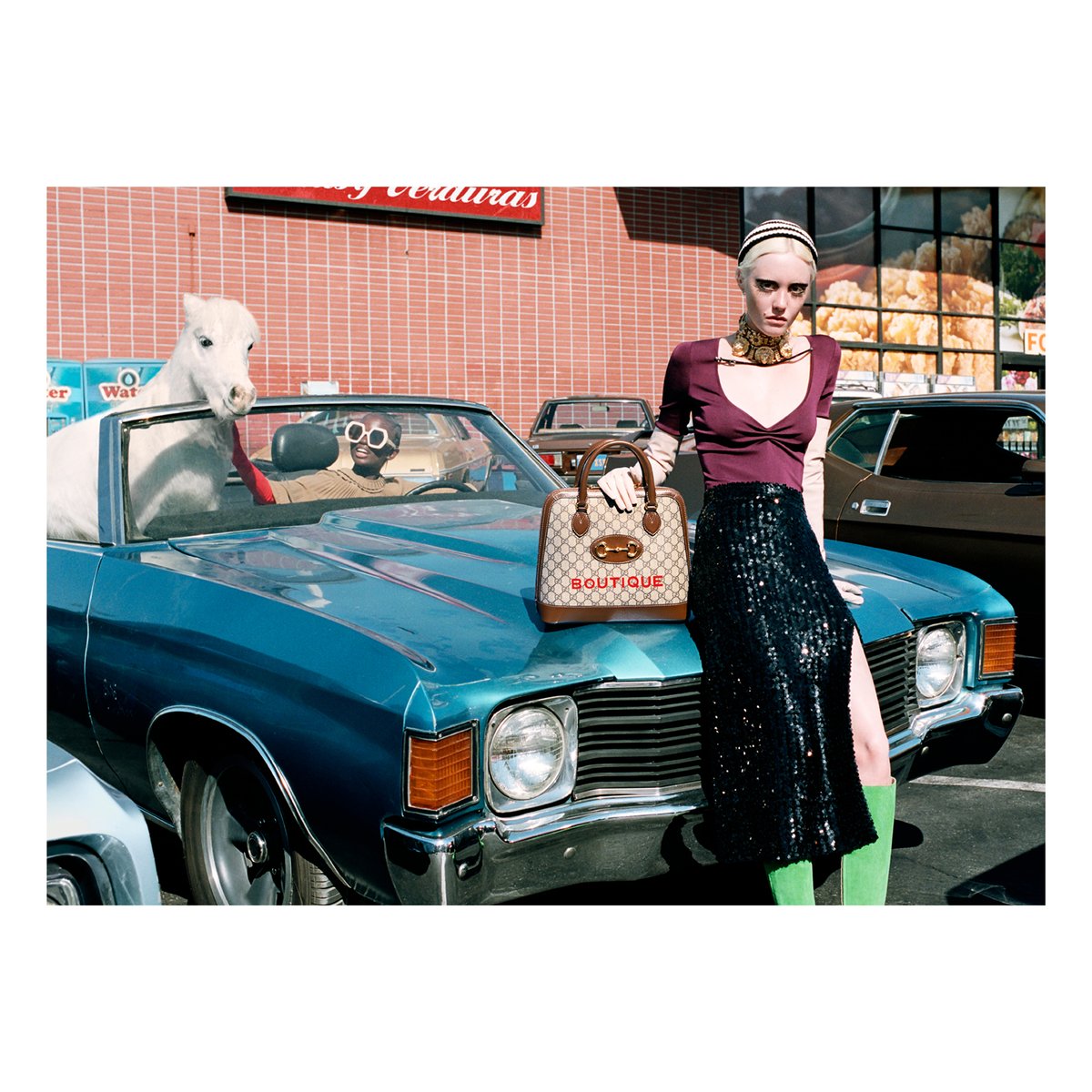 gucci's tweet image. An image by #YorgosLanthimos for #OfCourseAHorse—the new campaign art directed by #ChristopherSimmonds with creative direction by #AlessandroMichele—reveals the #Gucci1955Horsebit bag featuring the French word ‘Boutique’. on.gucci.com/Gucci1955Horse…