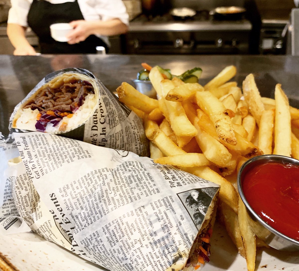 Our Spicy Bulgogi Wrap with red cabbage, carrots, rice, and a sweet soy glaze. Order up!