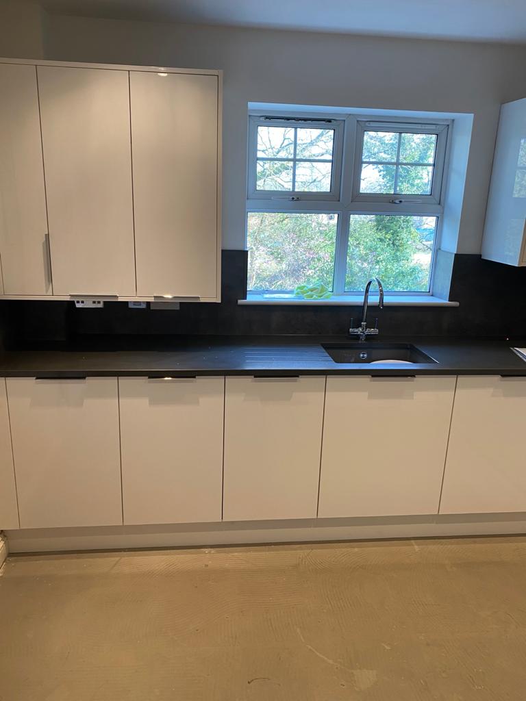 White handless gloss kitchen install this week #kitchen #kitchendesign #kitcheninstallations #kitchenfitters #kitchenrenovation #kitchenremodel