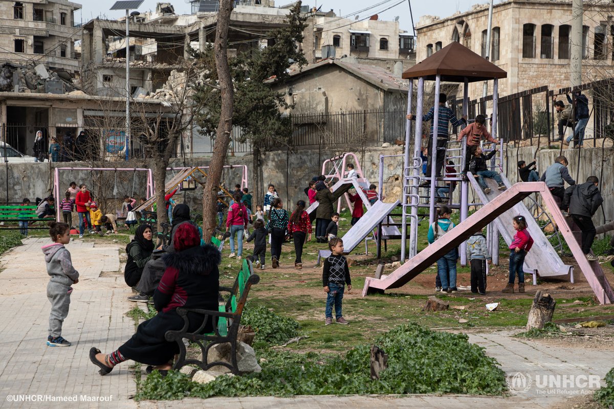 UNHCRinSYRIA's tweet photo. Boys and girls smiling in the playground, happy to have a place to play together.

In the background destruction is still immense and these boys and girls 5,6,7,8 &amp; 9 yrs old only know life in this crisis.

We work daily to support them. Let's not forget the kids in #Syria. https://t.co/pAqxz6lMHk