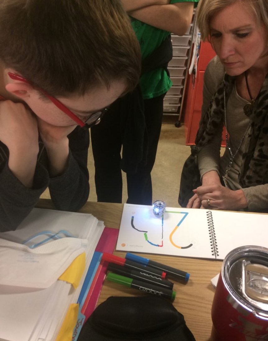 OneNorth's tweet image. Joe got his glasses! Not only did we raise enough to get him glasses that allow him to code with his eyes and not his fingers, the extra funds were spent on a new @Ozobot robot for the computer classroom at Hillsboro Junior High School. #glassesforjoe #youngcoder #techcommunity