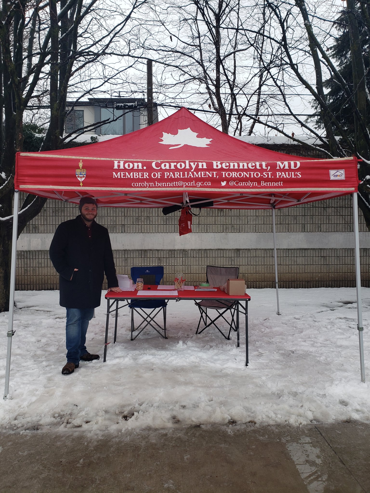 Photo of a man under a tent for Toronto St. Pauls MP Carolyn Bennett