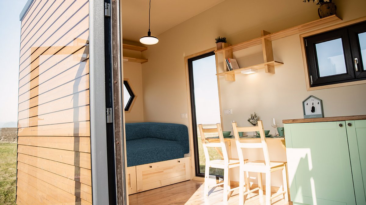 We spy with our little 👁️ a CouchBed sitting pretty in a tiny house!