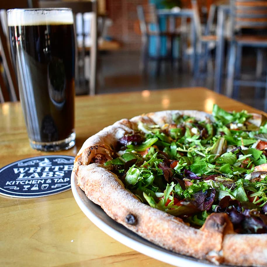It's Monday and we're back with another KILLER pizza special! 
⁣
Stop in and try our Baba Ganoush Pizza before joining us for TRIVIA tonight at 7PM! We're pairing this one with a delicious $3 Pasteur Porter fermented with WLP810 for the perfect malty finish. ⁣