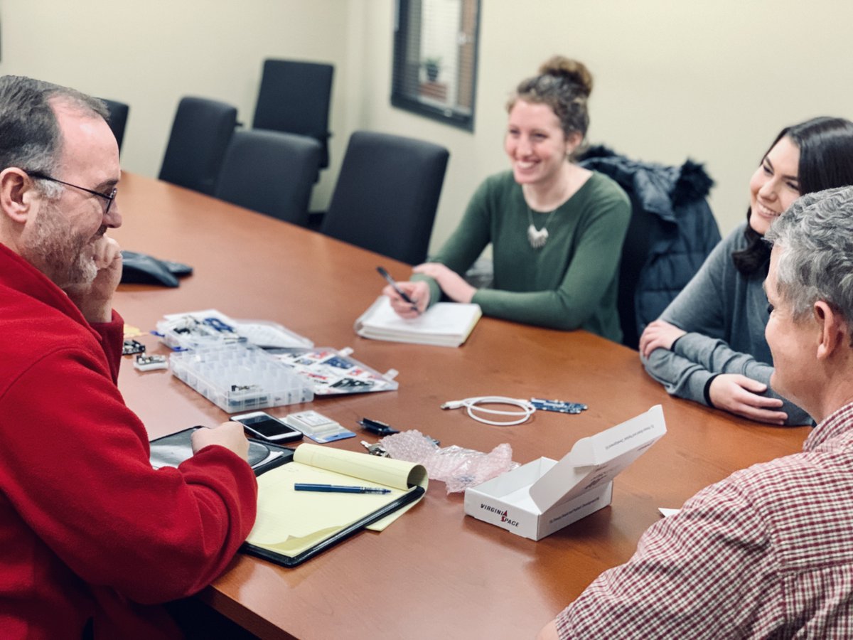 Students Rose White and Livia Rose (Computer Science Digital Media) meet with Rob Cartwright (Physics/Engineering) and Prof Stefan Brandle (PhD IIT in CS) to begin building Taylor's 6th satellite destined for low earth orbit.