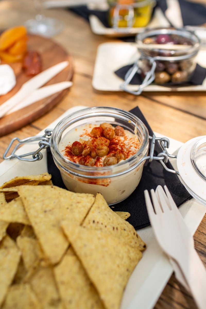 Our summer deck is the perfect place to prop yourself, right between the vineyard and the cellar door. It's been built around our peppercorn trees and is spoilt with views across the valley. 🖼