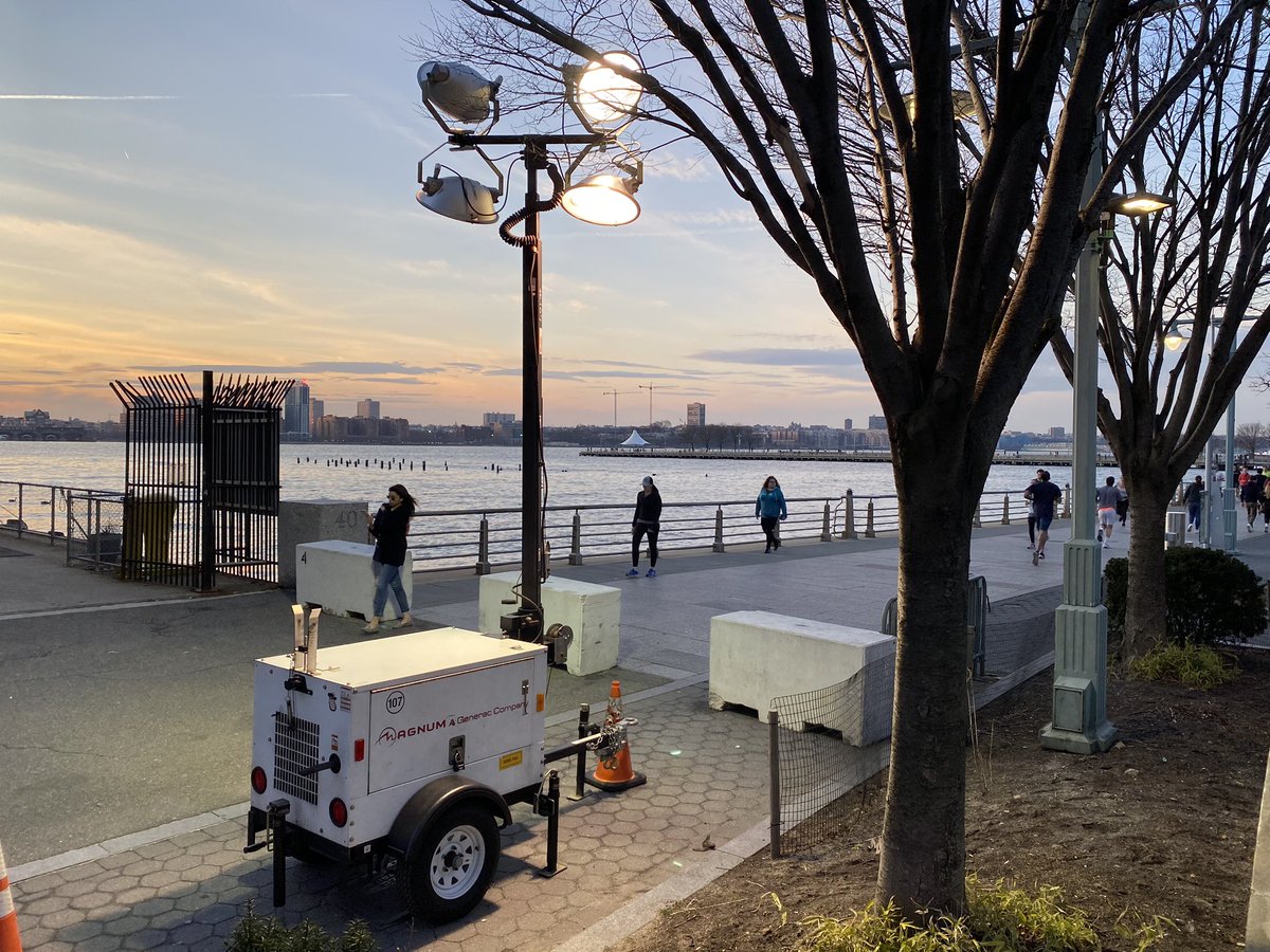 nickmosquera's tweet photo. @HudsonRiverPark Hi there - any reason there’s a loud diesel generator operating mere feet from existing light poles? It does appear it’s plugged into the electrical plate below, but if this is burning fuel now, these emissions seem unnecessary and unpleasant for folks in dog run https://t.co/hIkX1AghLs