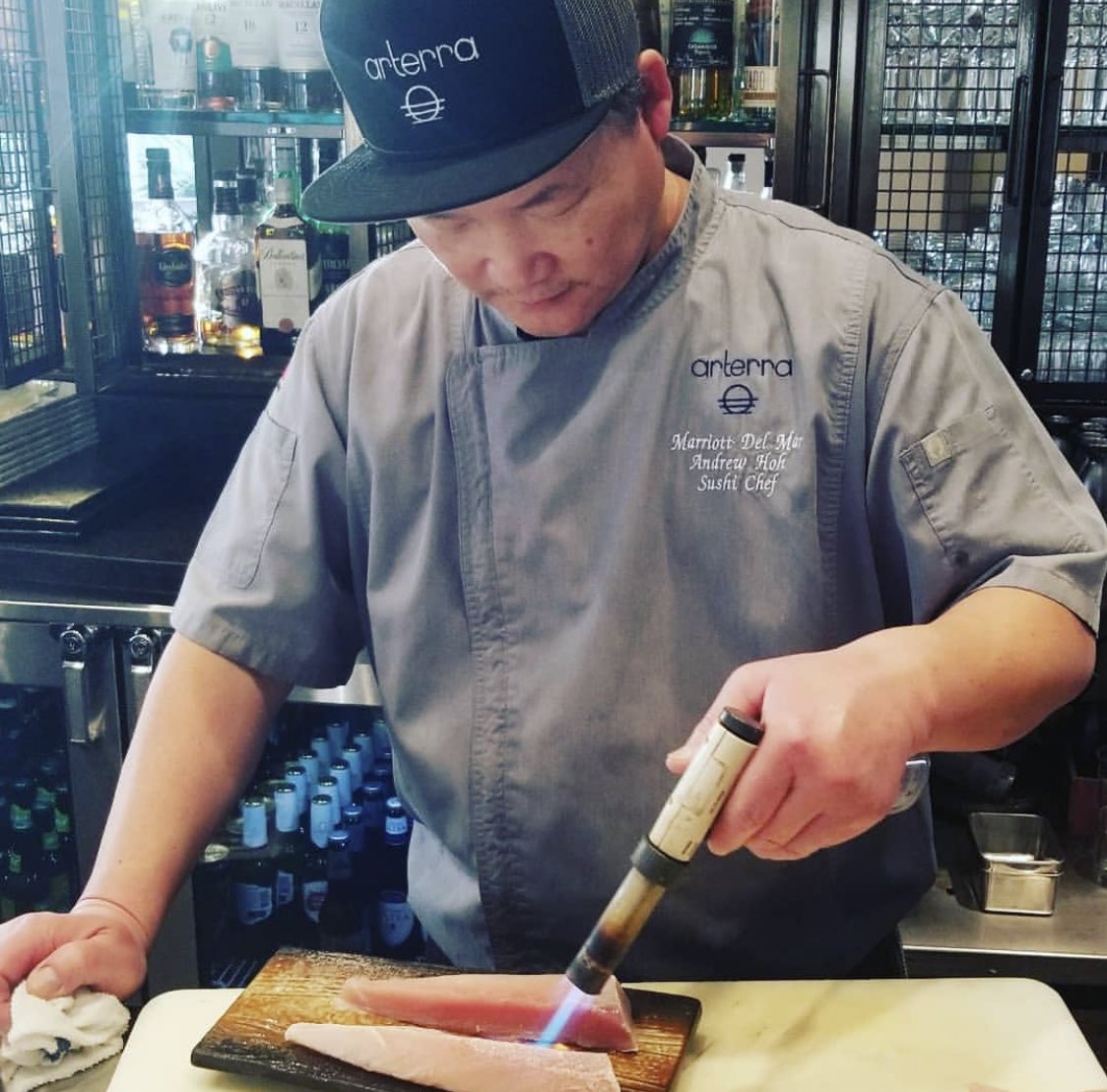 Chef Andrew Hoh brings the heat 🔥
📷: <a href="/DiningOutSD/">INFAMOUS Food + Drink</a> 
____________________
#sushi #sushimaster #sushichef #chef #sushilovers #sushibar #sandiegosushi #sandiego #delmar #sdeats #diningoutsd #eatsandiego #yelpsandiego #foodstagram