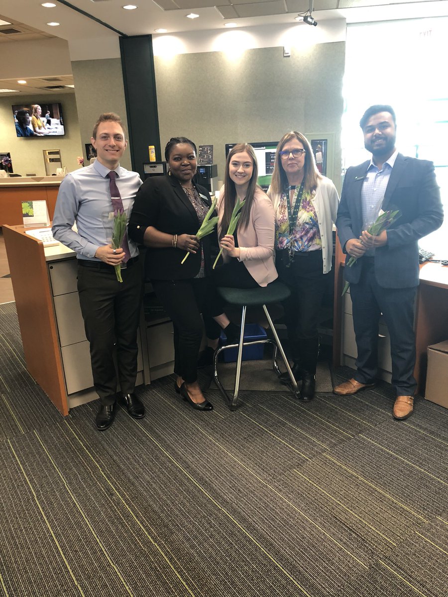 In celebration of International Women’s day, the men in the branch presented purple tulips to the women of our team.  Some of those involved are pictured here! #InternationalWomensDay