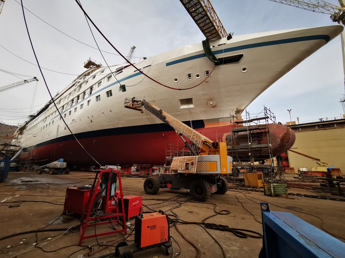 WindstarCruises's tweet photo. It's Star Breeze's last week in the dry dock. She has just received a coat of fresh paint. In a few days, will be floating out to spend more time in the wet dock before sailing to the US for her Alaskan summer. #windstarcruises #windstarplus
📸 Jack B., 2nd Officer. https://t.co/6DWjsBQvDE