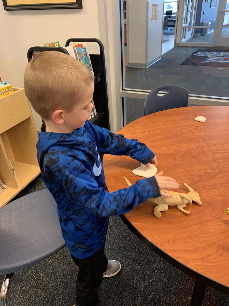 RocketReaders's tweet photo. Roaring into Reading with @LibertyRockets   First graders learned about fossils and made clay dino impressions to add to our dino museum exhibits.  Older students will identify and make inferences about the new fossils #learnbps @annebeninghof  @AMNH #PBL https://t.co/r4mDvzlr8p