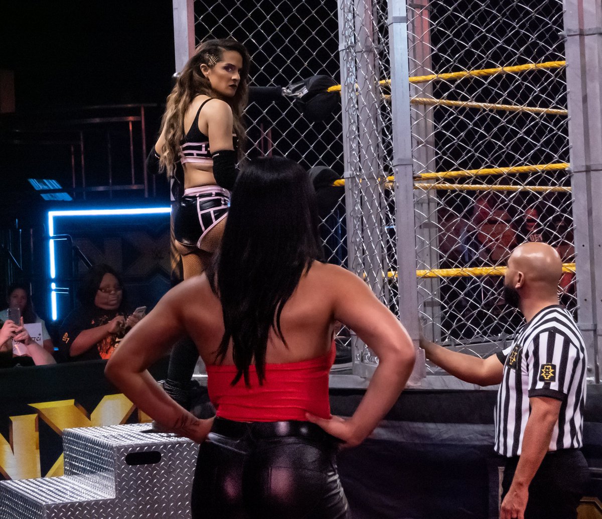 ThrillHolder's tweet photo. 📸 👑 #KingKota @DakotaKai_WWE making her way down to the cage with @RaquelWWE. 🤙

#NXT | #NXTonUSA | #NXTFSLive https://t.co/gOXTCeyF99