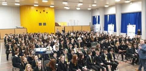 RmpsKa's tweet photo. Lovely to have Lesley from Kilsyth Community Food Bank join our charity assembly today! Students learned how important the food bank is to our local community. Proud to hand over our Crazy Day donation to support this cause! @kcfb1 @KAhumanities @KilsythAcademy #UNCRC #article27 https://t.co/i3eY0hhsVB