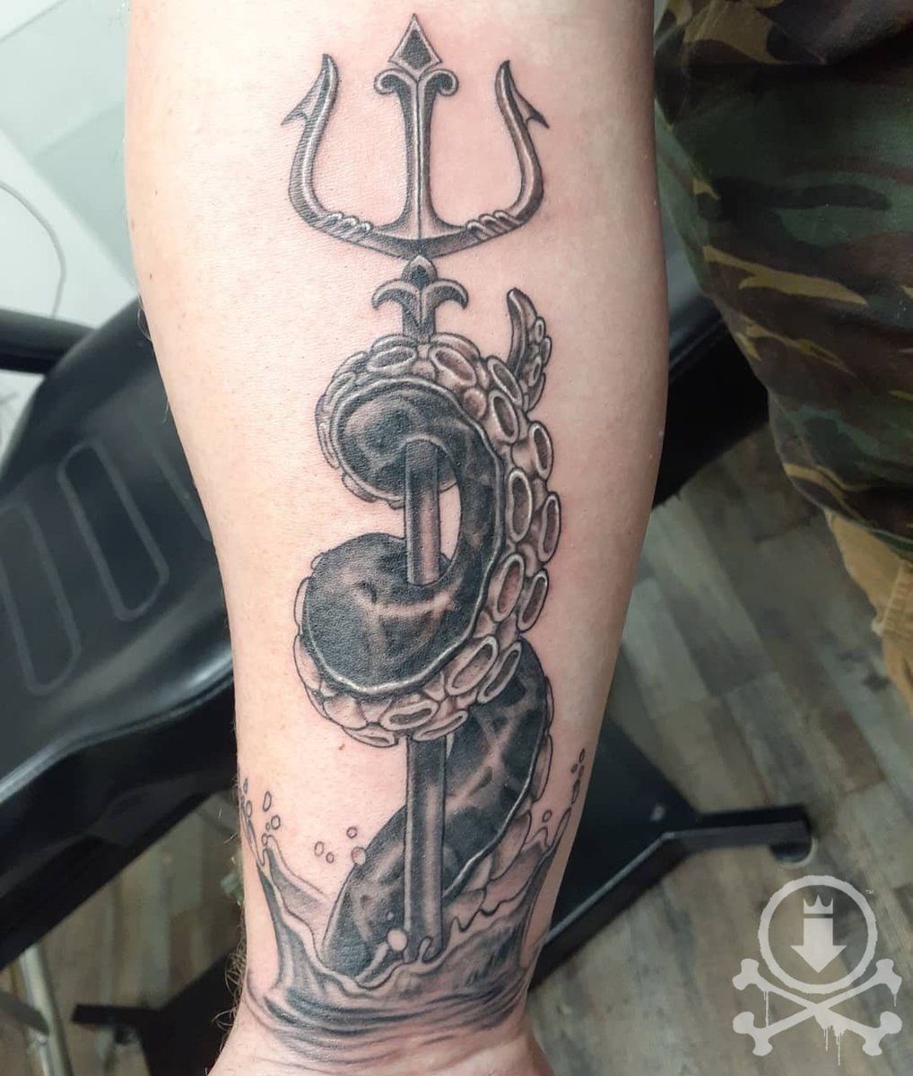 A trident with a snake, A significance of Lord Shiva. The uniqueness and  customisation of the tattoo piece says it all. Minimal detailing... |  Instagram