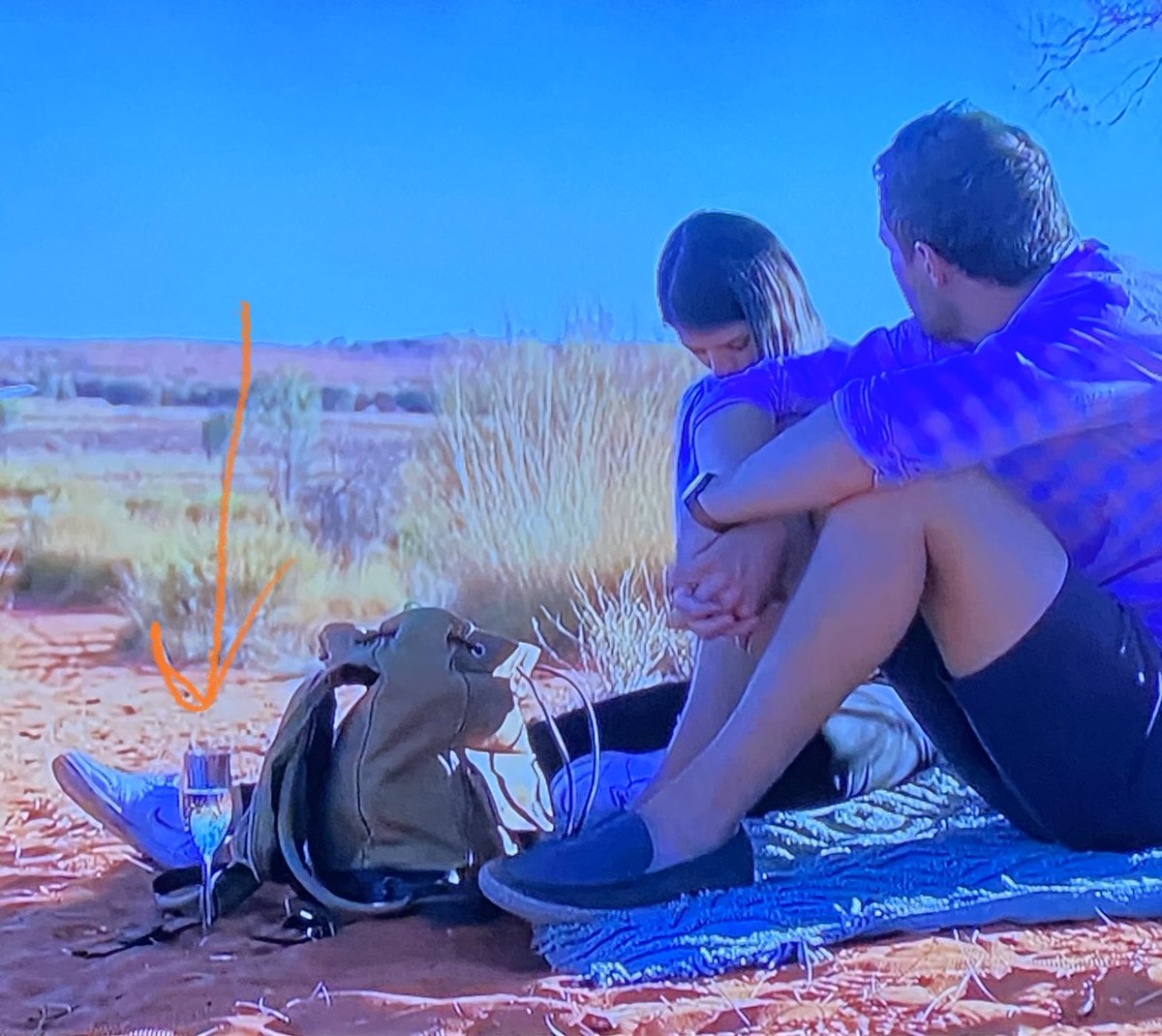 sevedegrand's tweet photo. The real MVP is whoever it was that balanced a glass of champagne on the sand #TheBachelor https://t.co/pBKjJ8pPk9