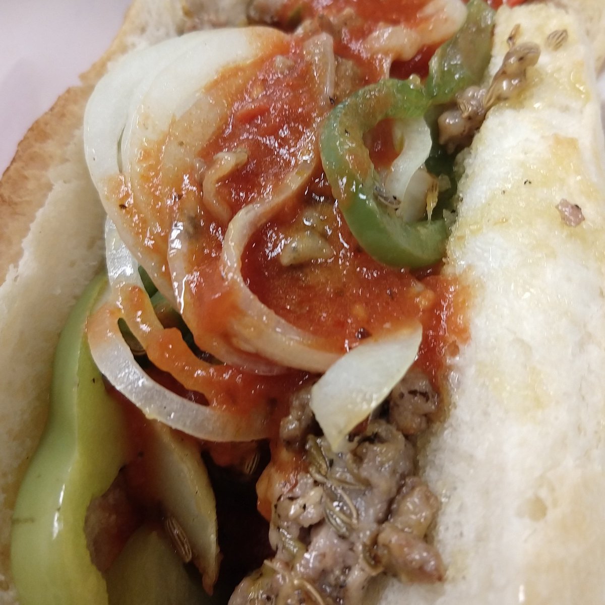 Homemade Italian Sausage with Peppers & Onions in a Sub Roll topped with our Fresh Tomato Sauce 🔥 #italianfood #homemade #qualityingredients #AuroraCO