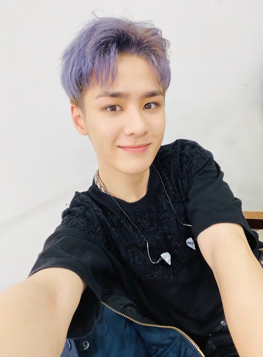 Kun with purple hair hits with the force of one hundred cans of grape soda.