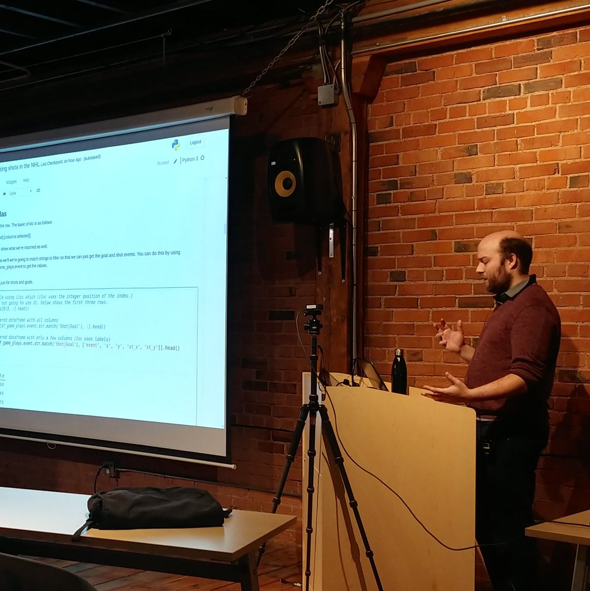 Dan doing a talk on Intro to Pandas by Analyzing Shots in Hockey.
