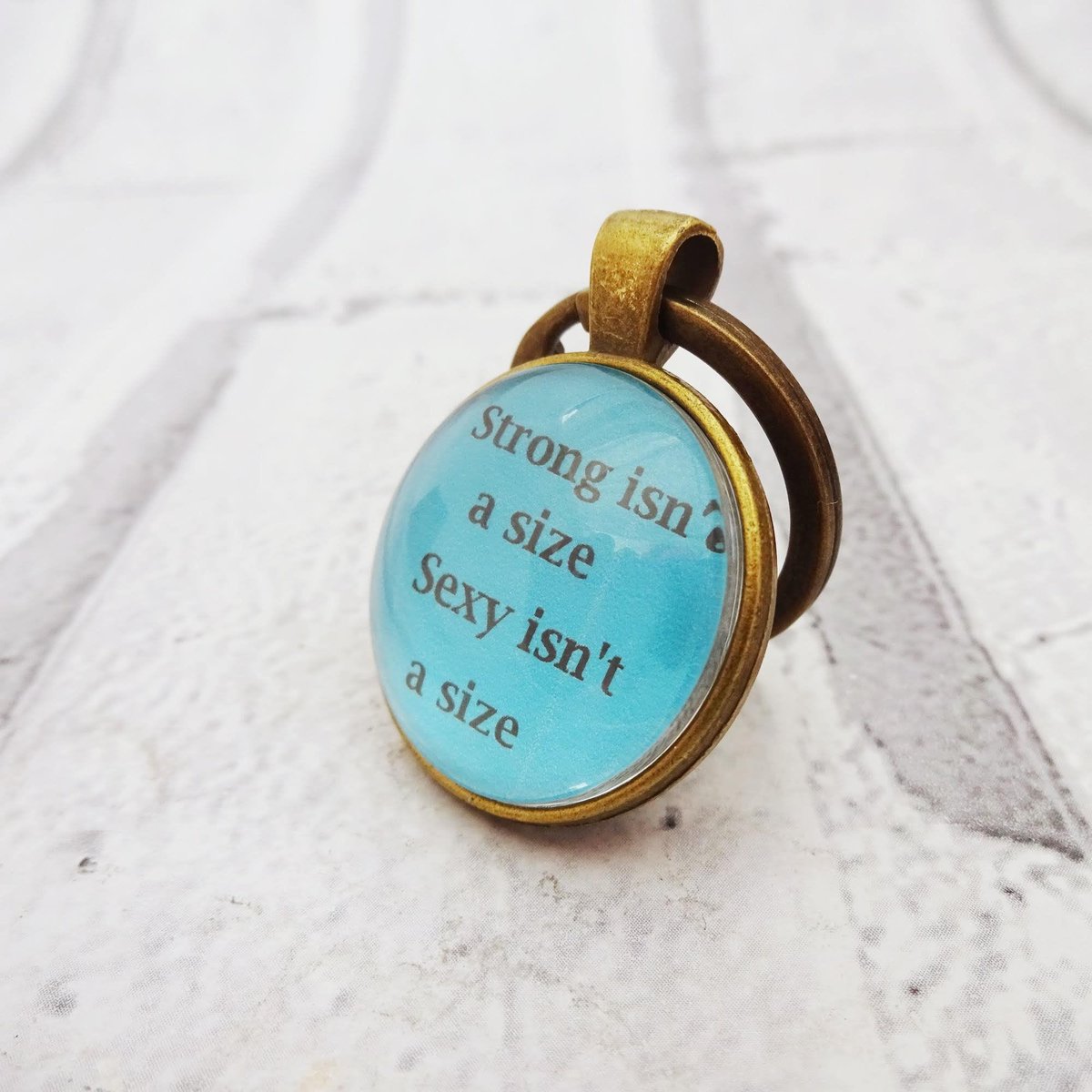 martisanne's tweet photo. body positive keyring, sexy isn't a size, strong isn't a size, feminist quote keychain, body confident quote, affirmation quote, empower, Q2 https://t.co/zo8eH0xLEp #EtsyTeamUnity #TMTinsta #AffirmationQuote https://t.co/tjQmgQ8PL2