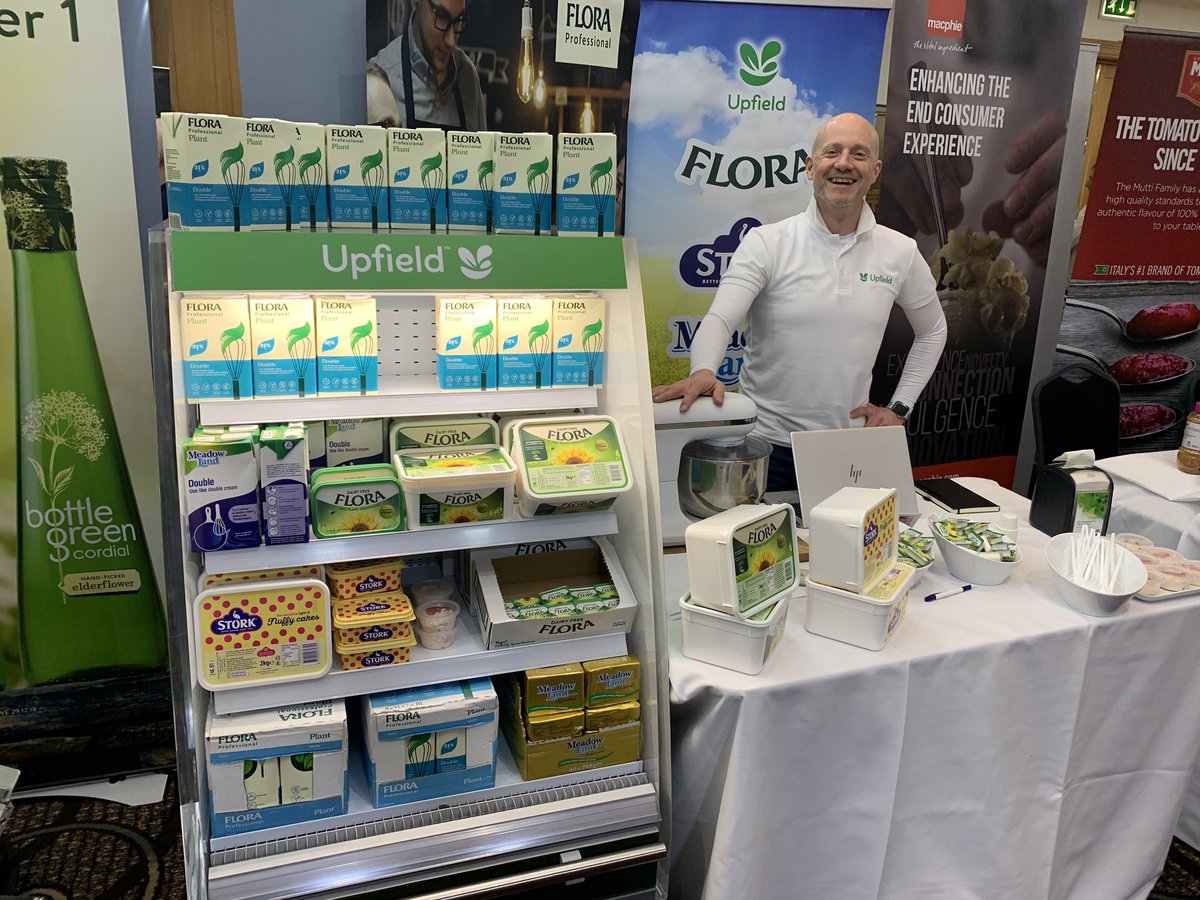 JezSear's tweet photo. Lee Pattern and Jeremy Sear at the Caterite Foodservice exhibition in Windermere sampling Flora Plant Double. A great reaction with many orders.@upfieldglobal @Caterite_Food #Vegan #vegetarian https://t.co/N4L72MjHzi
