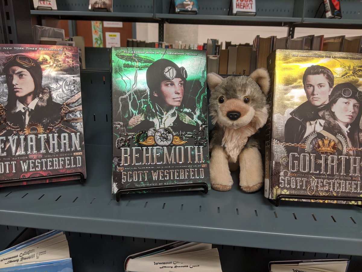 LibraryWCI's tweet image. Lupin is interested in one of the new trilogies in the library. Scott Westerfeld's Leviathan is World War One with a steampunk twist. #bewolves #amreading