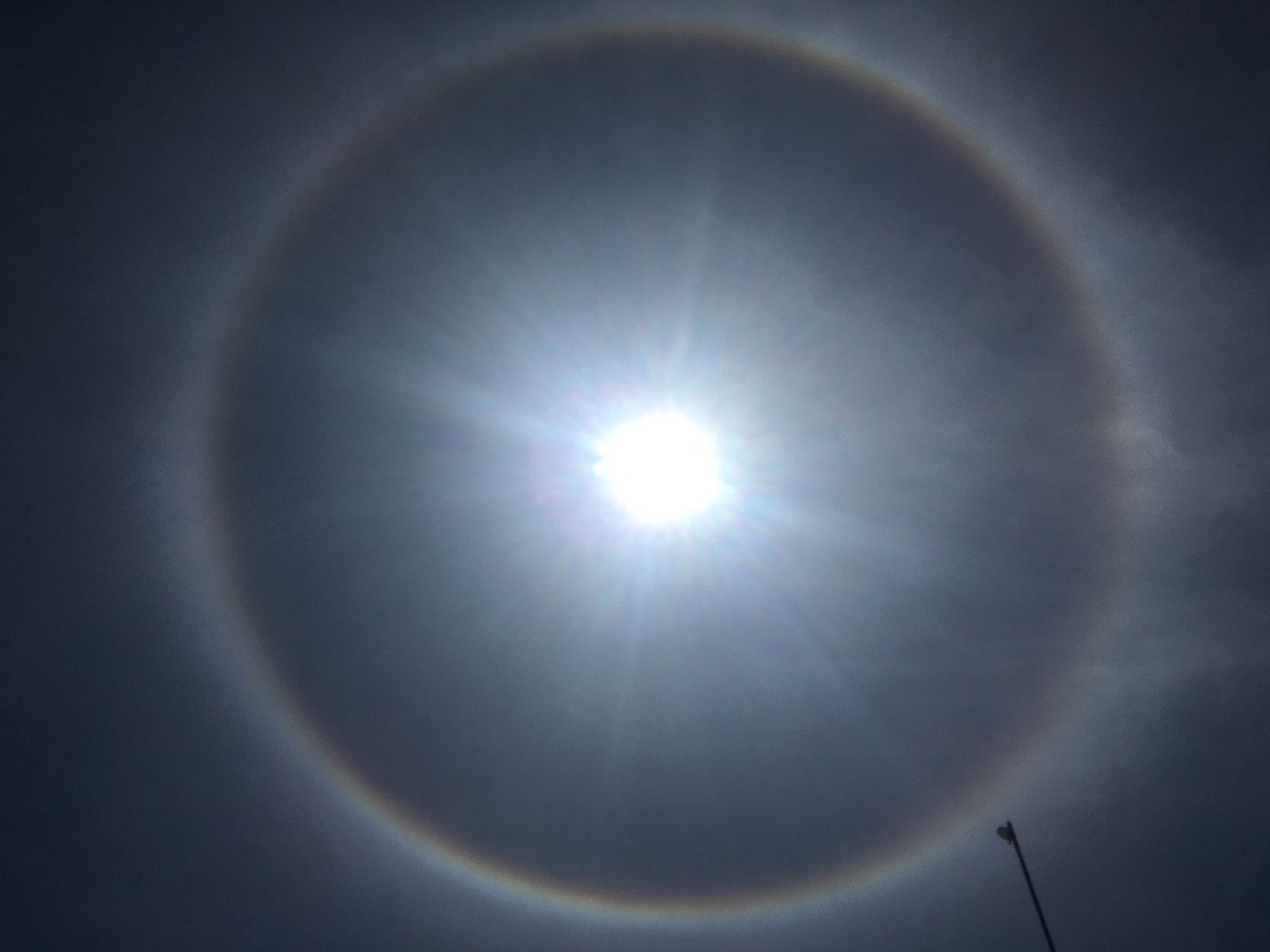 Rainbow halo around the sun at the moment in #botswana. Good luck must be on its way!