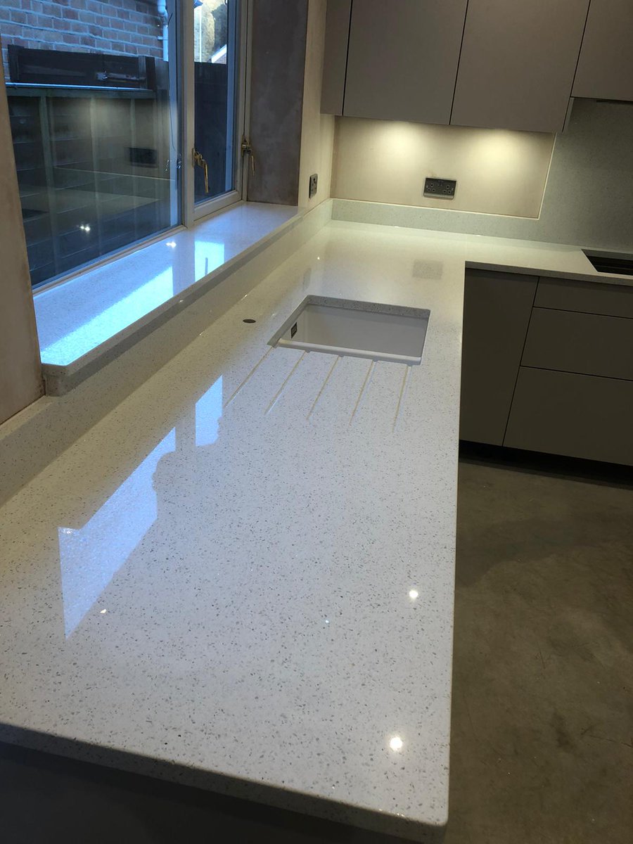 Don't you just love how this #beautiful #quartzworktop brings the light into this #kitchen? 😍 We installed this gorgeous #kitchenworktop for a Huttons Kitchen customer in #Brentwood using 30mm White Galaxy #quartz from Global Granite.