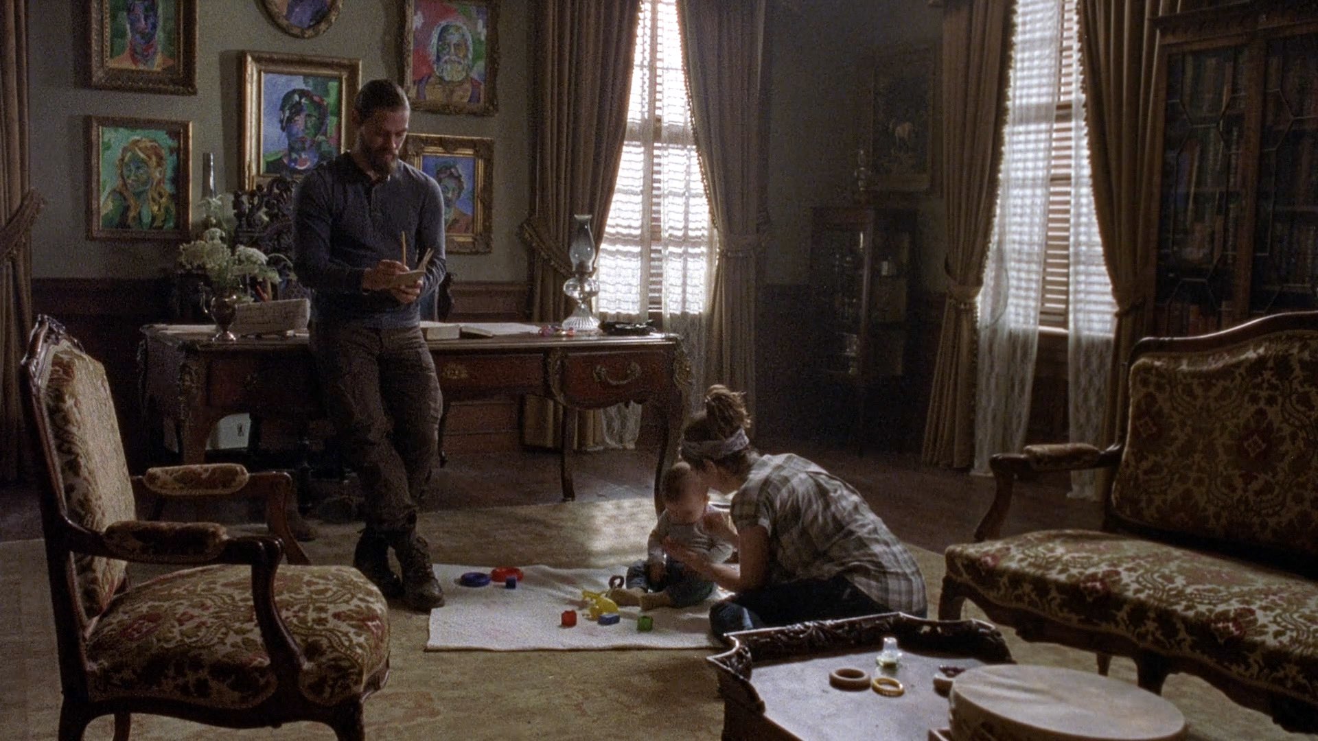 The Walking Dead Hq Carol Looking At A Painting Of Glenn And Maggie S Family That Anne Jadis Painted Maggie Hung Them In The Hilltop Barrington House Office Thewalkingdead Glennrhee Twdseason10 Glennrhee