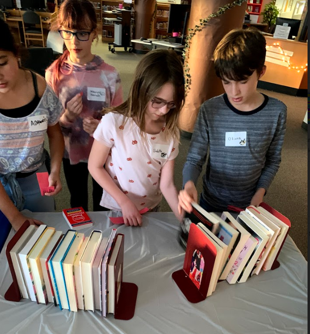 WileyLibrary's tweet photo. More Pics from the Percy Jackson Readathon!  Shopping at the Chase Library, Camp Half-Blood store and Mrs. Blofis' kitchen! #thisiswms #leanderisdlib https://t.co/1TmDZGWsCG