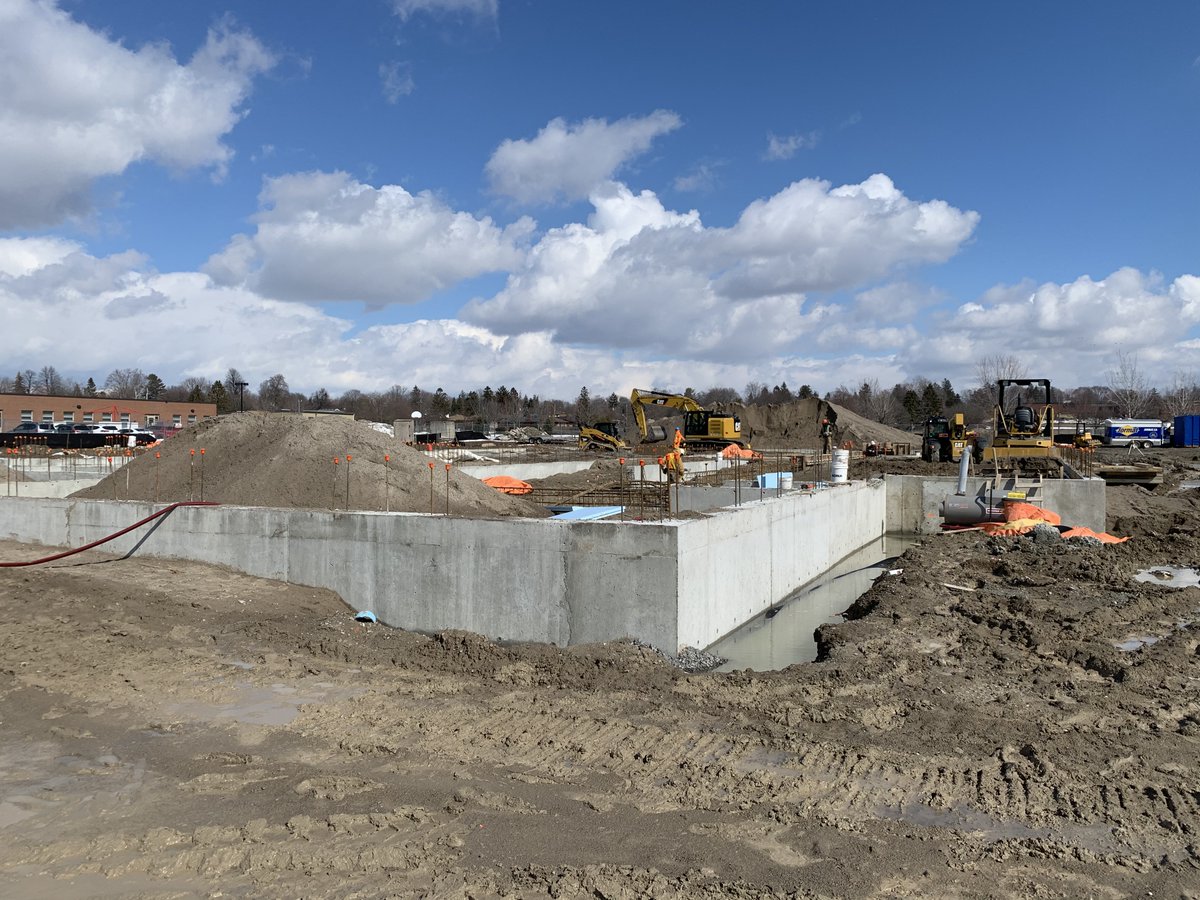 HossackAssoc's tweet photo. A beautiful day out on the construction site at the home of St. Marguerite d’Youville Catholic Replacement School. Foundation work is almost complete. @DurhamCatholic   #winterconstruction #schoolconstruction #foundationwork #sunnyskies https://t.co/uEh9Vvv4H7