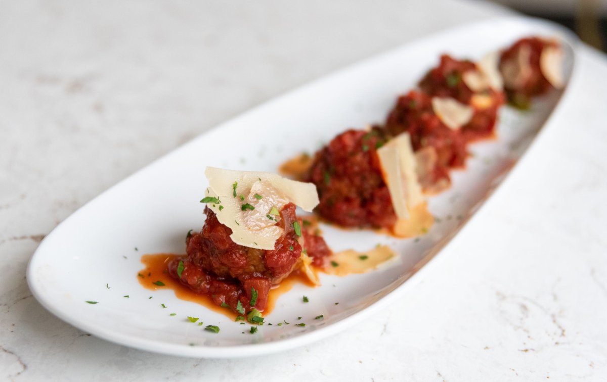 Opt for something savory for your #TuesdayTreat, like our Lamb Meatballs, with roasted red pepper &amp; tomato ragout, parmesan, and fresh herbs.