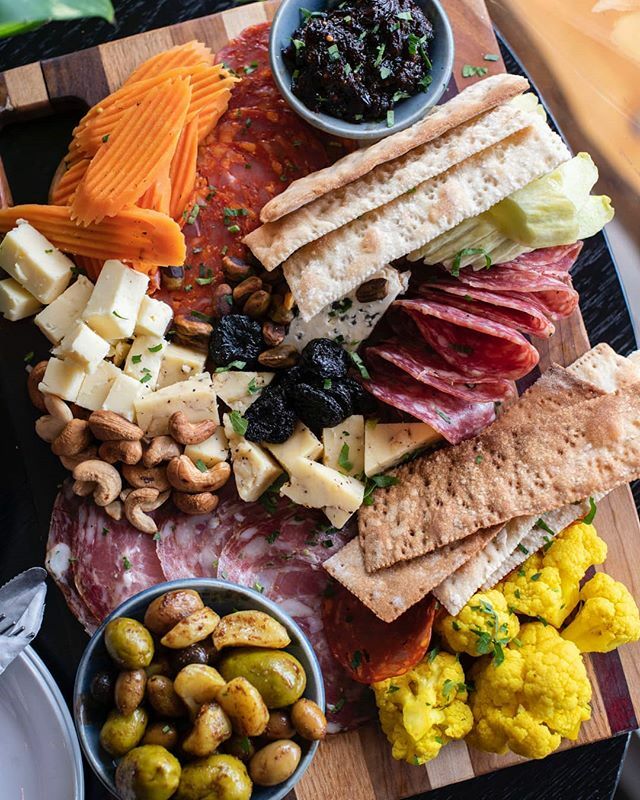 Enjoy a flavorful Charcuterie Board with your favorite cocktail, wine or craft beer tonight at @ediblesandessentials! Open at 4pm! #edibles #stlfood #stleats #cheeseplease