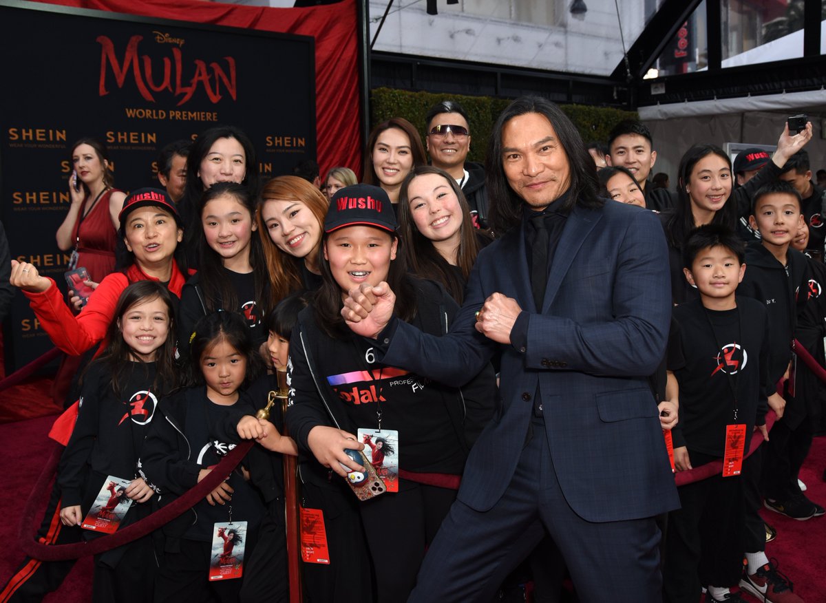 DisneyStudios's tweet photo. The stars of Disney's #Mulan command the red carpet at the World Premiere. See it in theaters March 27! https://t.co/QWBr2uBKcG