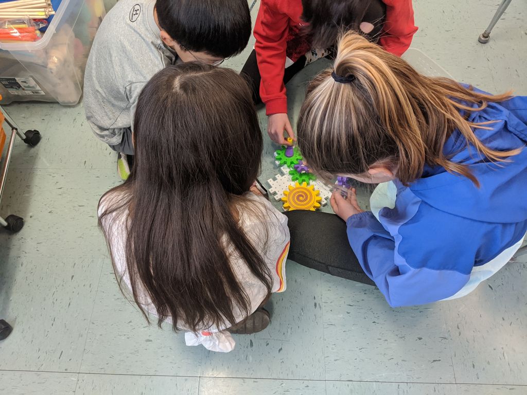Kinetic sculptures often have gears as a way to make things move at different speeds. Students today are experimenting to get a conceptual idea of gearing ratio and rotational direction.