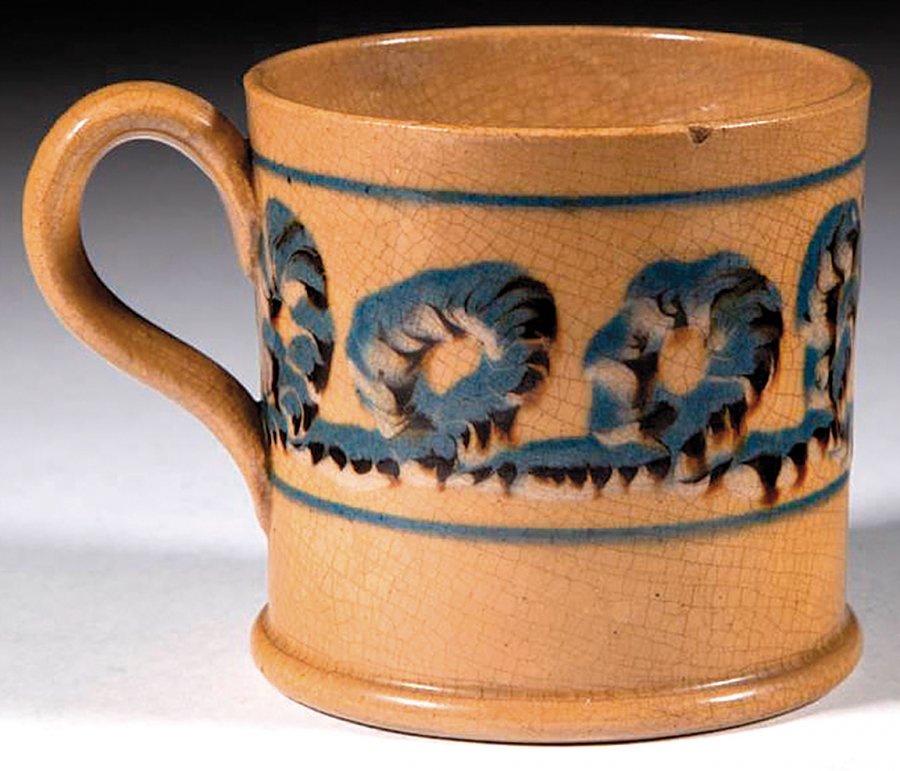 AntiqueDigest's tweet photo. 3" high mid-19th-century mocha-decorated yellowware mug decorated with a polychrome earthworm band sold for $819 (est. $100/200) at @jeffreysevans #antiques #antique #art #Americana #yellow #yellowware #mocha #mug #auction https://t.co/IDRHc854mz