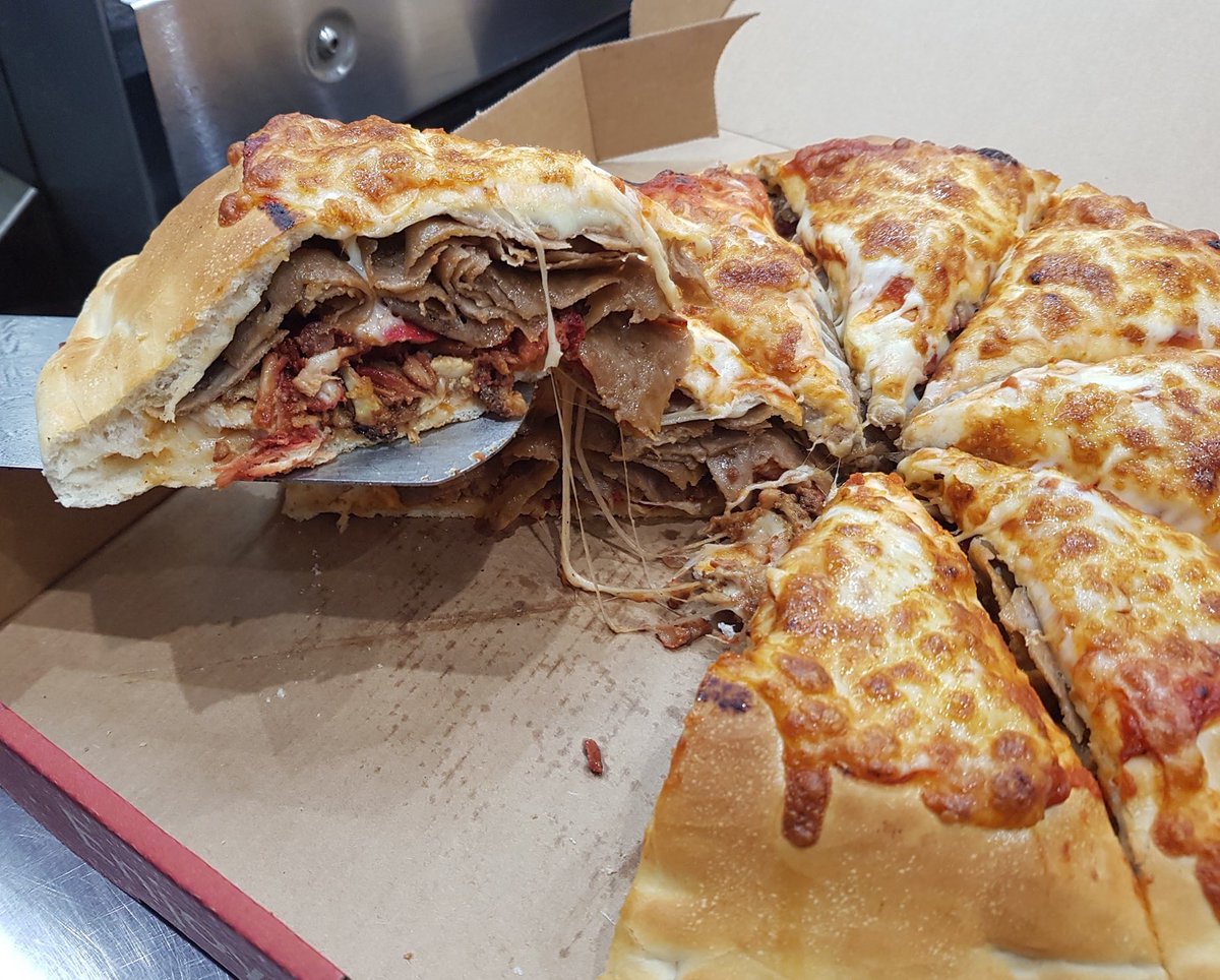 CALZONE KEBAB!? 🥙🍕🧀

 (2 pizzas with tikka, shawarma, Donner and cheese sandwiched in the middle)🤯🥵🤤