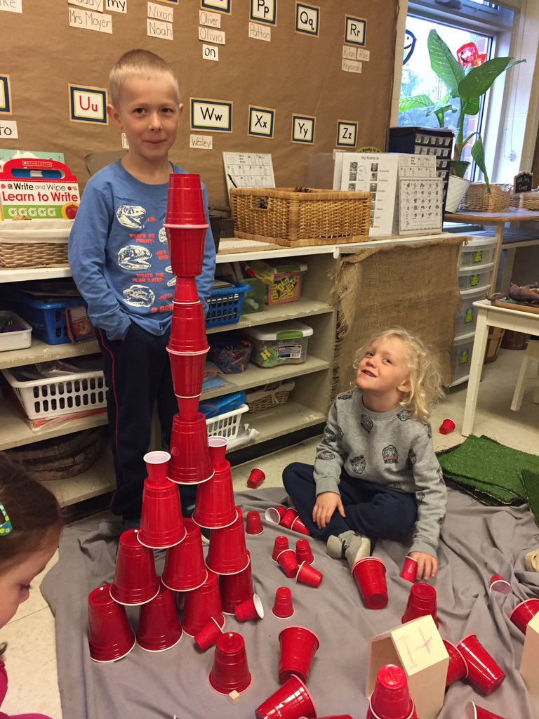Loose parts in Kindergarten. What could you create? This tower “is almost as tall as me”.  Collaboration, creativity and communication. 21st century learning <a href="/WorsleyES/">Worsley E.S.</a>