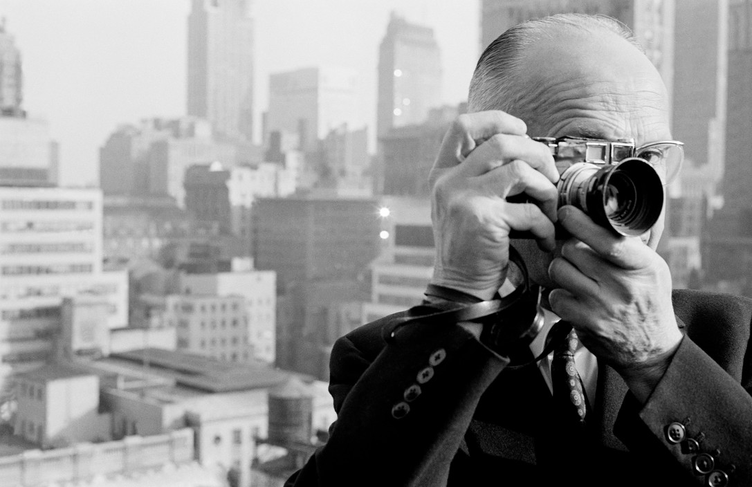  Great photographers by great photographersDennis StockHenri Cartier Bresson with his trusty Leica Rangefinder, with a 50 mm. lens, 1961. He took most of the shots in a lifetime of work with this model