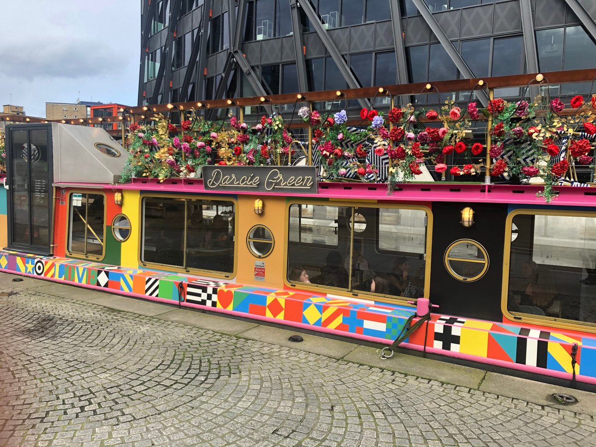 Craftinsure's tweet photo. Loving @DaisyGreenFood on Union Canal, Paddington Station. Floating bar and restaurant with combined 50m upper deck, designed by the great #peterblake 
Truly a floating work of art. #darcieandmaygreen #floatingfood #canaldining https://t.co/86ukCs93U7