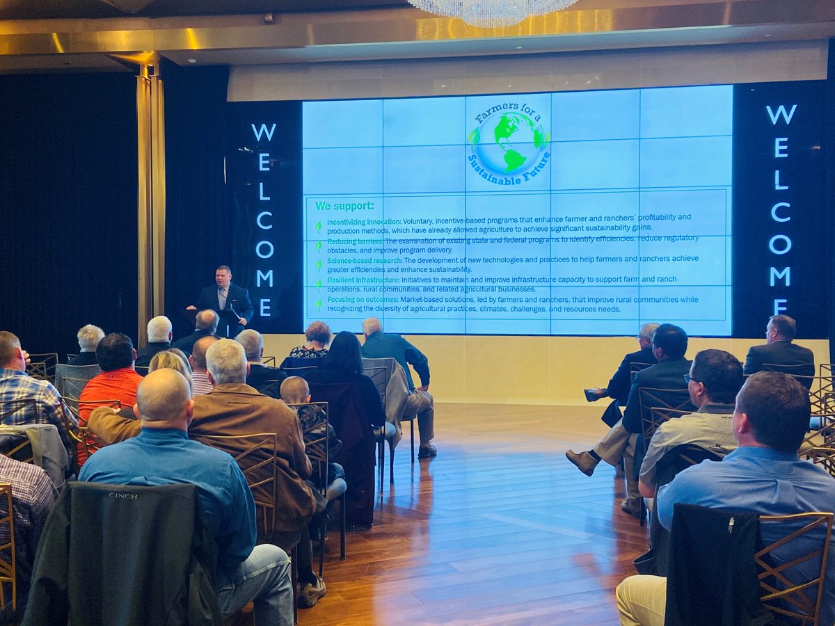 KSFarmBureau's tweet photo. Andrew Walmsley of @FarmBureau introduces a new initiative and coalition to members attending KFB's LEADs trip. Farmers for a Sustainable Future advances the successful sustainable practices used by U.S. ag producers. Learn more:  https://t.co/YYYACxCLxV #KFBAdvocacy #KFBLEADs https://t.co/iU8gx1m1xH