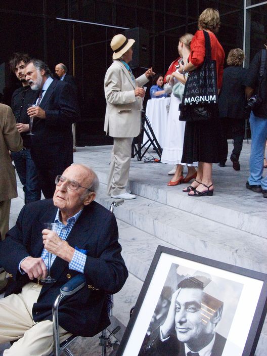 Great photographers by great photographersChris Steele-PerkinsBurt Glinn next to photo of Robert CapaNew York, 2007