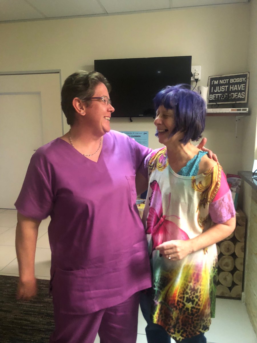 Me laughing rather hysterically with my amazing #surgeon #postop #pinksocks #canceratwork #addilang