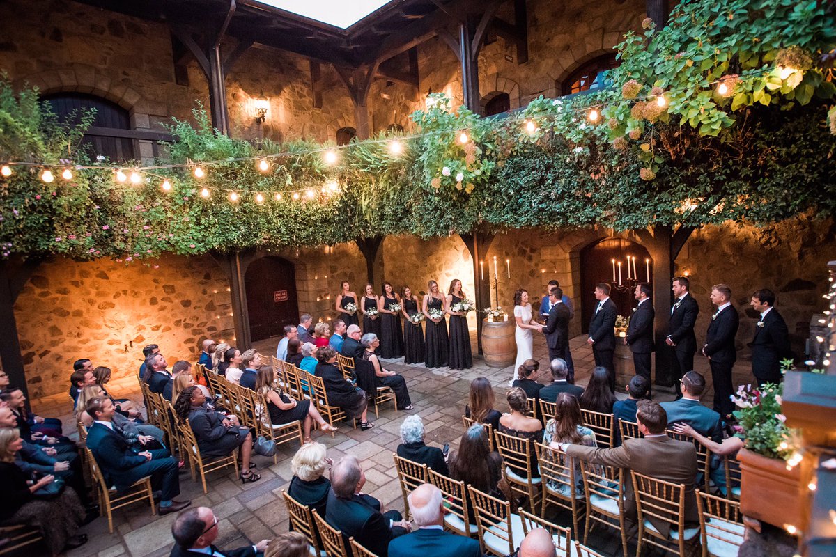 Napa Valley Wedding ceremony in the courtyard at the always enchanting @vsattui #magicalweddingvenue #napavalleywedding #ceremony #winerywedding #napastyle #kenvialephotography