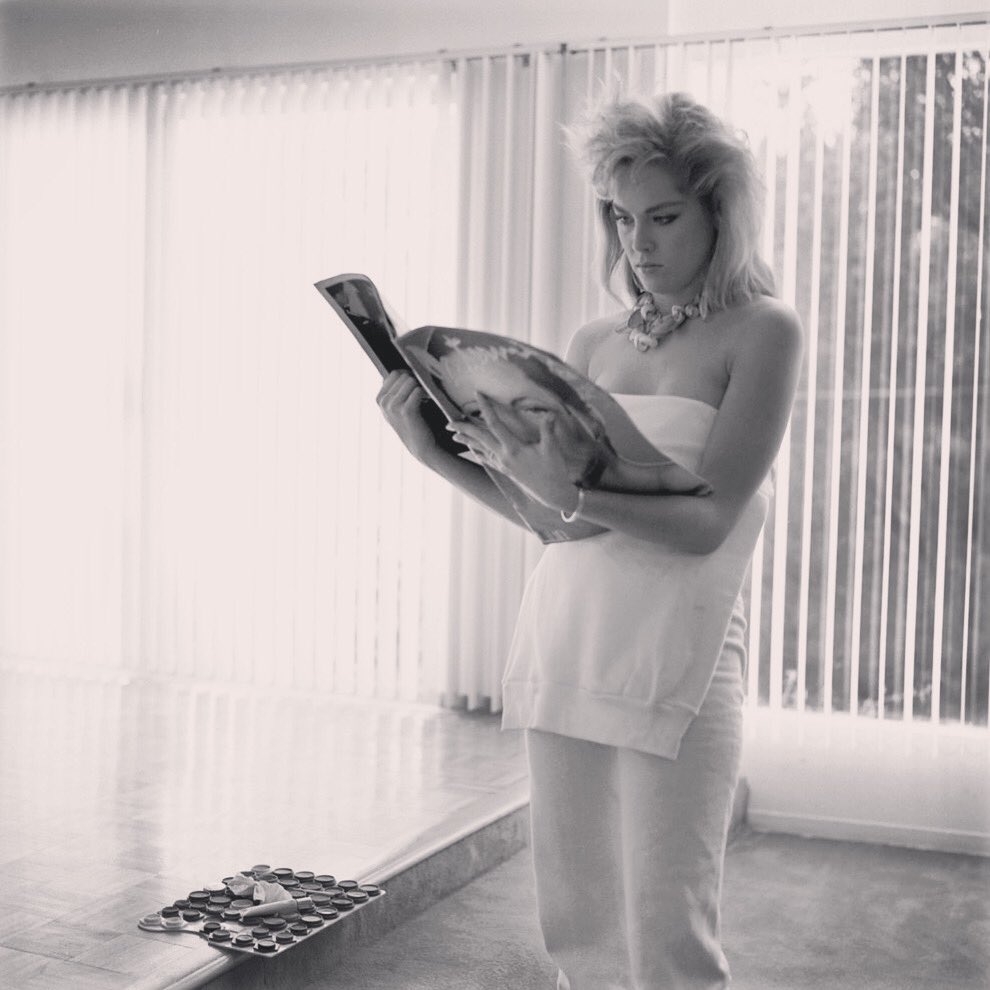 Happy Birthday to Sharon Stone! Here she is reading Andy Warhol.   