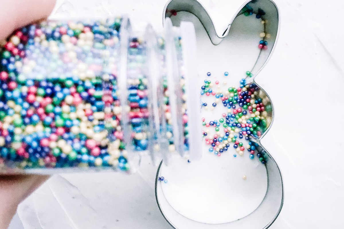 Well this is fun! An Easter Bunny Cake idea that not only will kids love, but adults too! It's a great Easter Dessert that involves simple decorating skills using only a cookie cutter. #easter #easterbunny #easterbunnycake #easterdessert #eastercake productivepete.com/sprinkles-east…