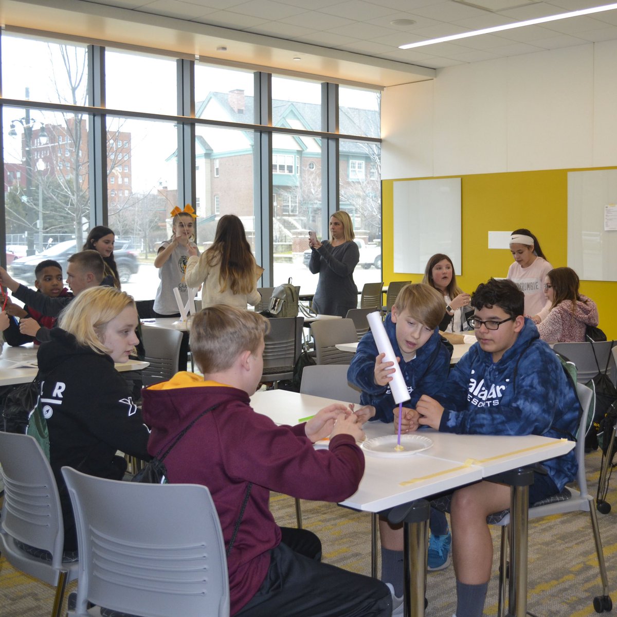 IlitchBusiness's tweet photo. #WSUSTEM Day students visited the Ilitch School today! Interactive learning sessions covered statistics, finance, supply chain, engineering and more while using the likes of M&Ms, paper air planes and paper towel tower construction as teaching aids. https://t.co/HmQYiCA1L1