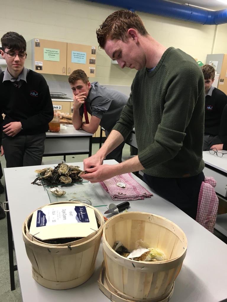St_Marys_cbs's tweet photo. Miss Murphy’s Home Ec class enjoying the finer things in life this afternoon during @FEASTireland presentation. The boys sampled Galway oysters, sourdough bread and Carrigaline cheese with a selection of pickled seaweeds and chutneys. https://t.co/usH4hLpdxm